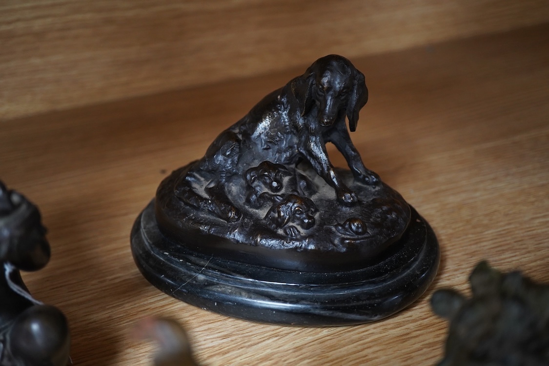 A small bronze of a of a hound and puppies after Louis Theophile Hingre (1832-1911), on marble base- 14.5cm wide, a painted bulldog ink stand, a putti and a fairy and two models of apples. (6).